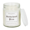 A clear 9oz jar with 8oz of white candle inside it.  The lid is white and screws on.