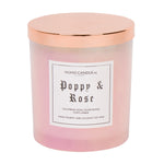 A pink glass jar candle with a copper lid.  It's a 14oz Poppy & Rose candle.