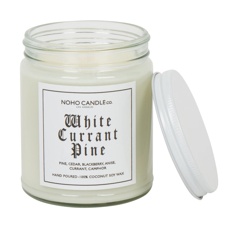 An 8oz short White Currant Pine candle.  The wax is white, the jar is clear, and the lid is white and screws on.